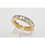 A 14CT GOLD CUBIC ZIRCONIA ETERNITY RING, designed as channel set circular and rectangular