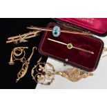 AN EARLY 20TH CENTURY COLLECTION OF ASSORTED GOLD JEWELLERY, to include, a garnet open work pendant,