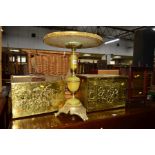 A BRASS AND ONYX CIRCULAR TOPPED OCCASIONAL TABLE, a brass log box, magazine rack and a wall cabinet