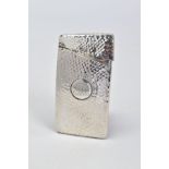 A GEORGE V SILVER RECTANGULAR CARD CASE OF BOWED FORM, hand hammered finish, initials engraved to