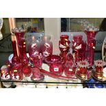 A COLLECTION OF CRANBERRY GLASS, to include Mary Gregory finger bowls, oversize glass frigger