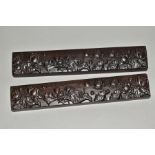 A PAIR OF LATE 20TH CENTURY CHINESE CARVED WOODEN WRIST RESTS, flower head decoration, length