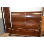 A REPRODUCTION MAHOGANY 5' SLEIGH BED FRAME (sd, deep surface marks)