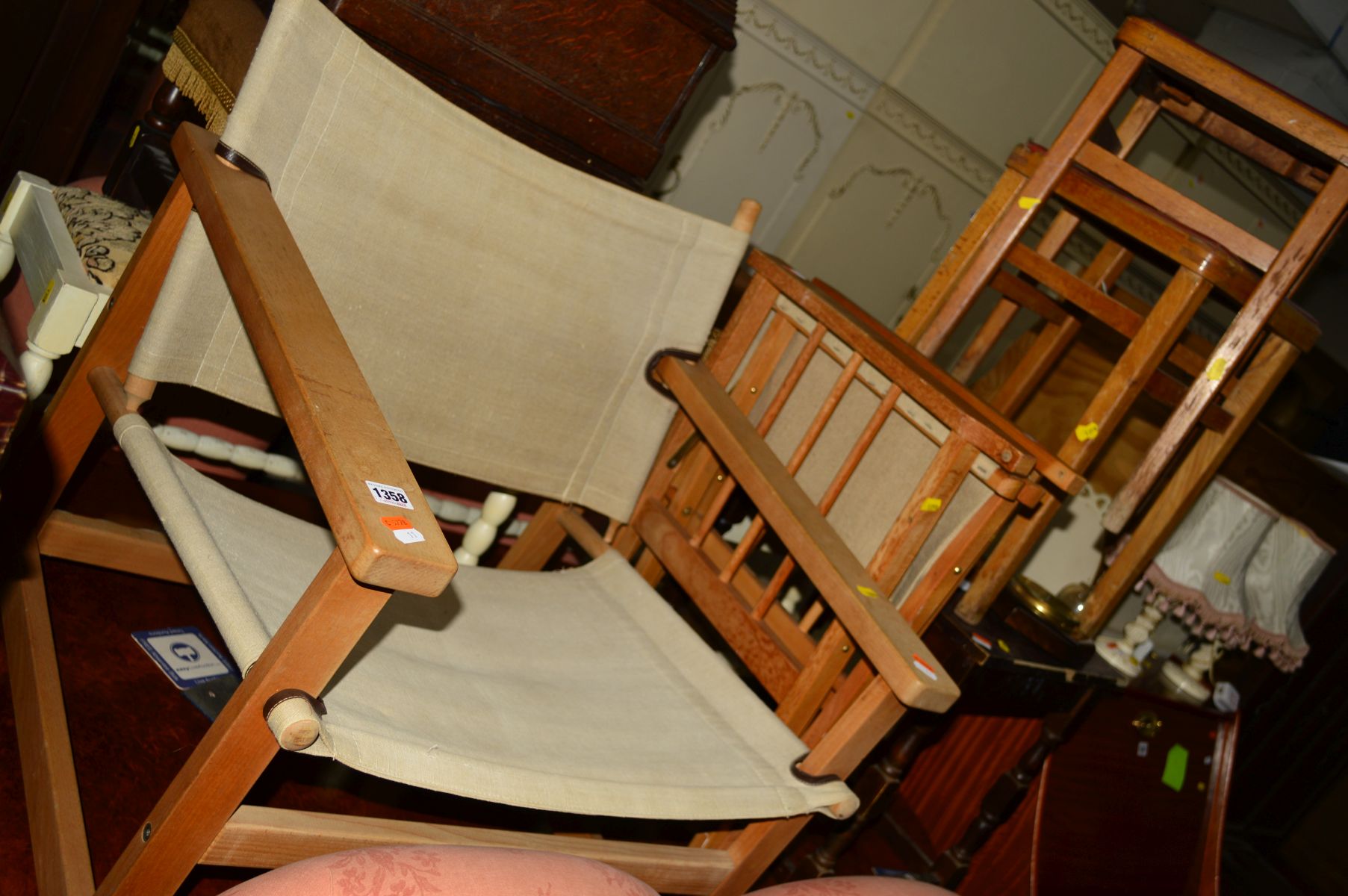 A MID 20TH CENTURY BEECH AND FABRIC ARMCHAIR, a folding beech directors chair, together with a