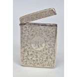 A LATE VICTORIAN SILVER CARD CASE OF RECTANGULAR FORM, hinged top, foliate engraved throughout,