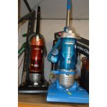 A HOOVER 2200W UPRIGHT VACUUM CLEANER together with a Hoover 2100W upright vacuum cleaner (2)