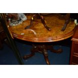 A LATE VICTORIAN WALNUT AND FOLIATE SATINWOOD INLAID OVAL LOO TABLE, on scrolled base, width 105cm x