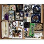 A BOX OF COSTUME JEWELLERY, to include an amethyst bracelet, imitation pearl necklaces, china flower
