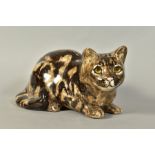 A WINSTANLEY TABBY CAT, lying, signed to base and No5, length 28cm