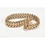 A 9CT GOLD DOUBLE CURB LINK BRACELET, fitted to a box clasp, measuring 175mm in length, hallmarked