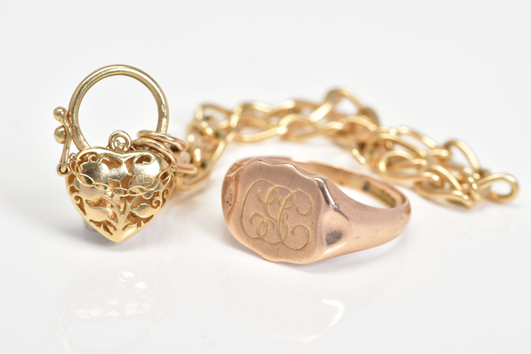 A 9CT GOLD BRACELET AND RING, the 9ct gold signet ring with engraved scrolling initials, ring size