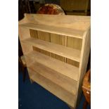 A STRIPPED OAK OPEN BOOKCASE width 110cm x depth 24cm x height 142cm