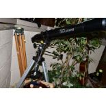 A CELESTRON POWERSEEKER 80EQ TELESCOPE AND TRIPOD, focal length 900M f11 incomplete, together with a