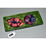 A MOORCROFT POTTERY RECTANGULAR PIN DISH/PEN DISH, 'Anemone' pattern on green ground, impressed