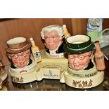 A ROYAL DOULTON STAND 'THE PICKWICK COLLECTION', with three Royal Doulton advertising character