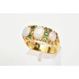 AN 18CT GOLD OPAL AND EMERALD RING, designed as three graduated oval opals, the central opal flanked