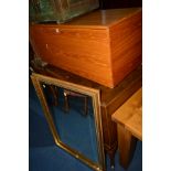 A MID 20TH CENTURY TEAK BLANKET CHEST and a modern gilt framed wall mirror (2)