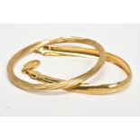A 9CT GOLD BRACELET AND A HINGED BANGLE, the bangle of twist design with push clasp, with 9ct import
