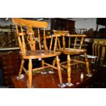 AN EARLY TO MID 20TH CENTURY OAK AND MAHOGANY SMOKERS ARMCHAIR together with a beech armchair and