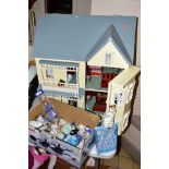 A MODERN WOODEN DOLLS HOUSE, modelled as a three storey Edwardian villa, front opening, has some