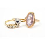 THREE GEM RINGS, to include a 9ct gold oval amethyst ring, an 18ct gold sapphire and diamond cluster