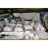 JOHNSON BROTHERS DINNERWARES, florally decorated on white ground, to include tea pot, covered sugar,