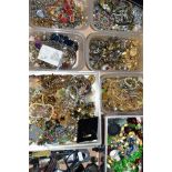 A BOX OF COSTUME JEWELLERY AND WATCHES, to include designer costume jewellery clip earrings