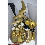 A COLLECTION OF BRASSWARE, to include brass eagle on a branch, height 54cm, brass cannon, scales