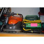 A FLYMO VISION COMPACT 350 ELECTRIC LAWN MOWER together with a Qualcast Concorde electric lawn mower