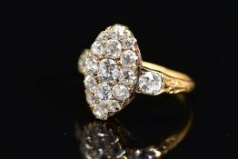 A VICTORIAN GOLD NAVETTE SHAPED DIAMOND CLUSTER RING, estimated old European cut diamond weight 1.
