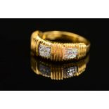 AN 18CT GOLD DIAMOND BAND RING, estimated diamond weight 0.24ct, ring size L, hallmarked 18ct