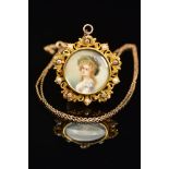 AN EARLY 20TH CENTURY GOLD, DIAMOND AND SEED PEARL PORTRAIT MINIATURE PENDANT/BROOCH, of circular