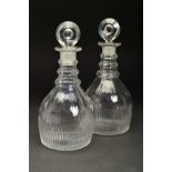 A PAIR OF GEORGE III MALLET SHAPE GLASS DECANTERS WITH FACET CUT TRIPLE RING NECKS, bull's eye