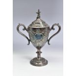 A LATE VICTORIAN SILVER PLATED TWIN HANDLED TROPHY CUP OF MILITARY INTEREST, the pull off cover with