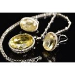 AN 18CT WHITE GOLD, CITRINE AND DIAMOND PENDANT AND MATCHING EARRINGS, the pendant designed as a