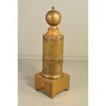 A 19TH CENTURY BRASS AND GILT METAL DECORATIVE ROOM HEATER, the chimney covered with lidded