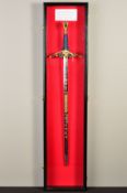 A FINE LIMITED EDITION DISPLAY SWORD, contained in a handmade display case commemorating the 50th