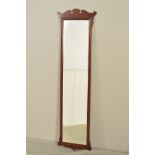 A GEORGE III STYLE MAHOGANY FRET CUT WALL MIRROR, bevel edge plate, approximate width 49.5cm x