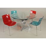 A CALLIGARIS TIVOLI CIRCULAR GLASS TOPPED DINING TABLE, on a five leg chrome apex style base,