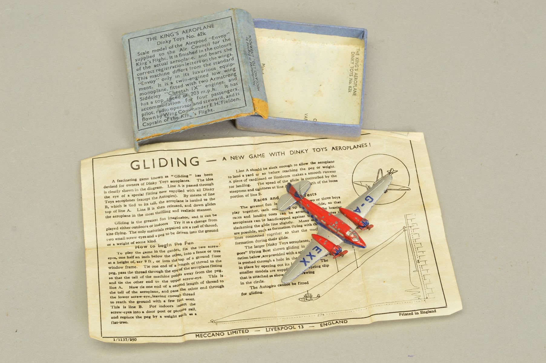 A BOXED DINKY TOYS THE KING'S AEROPLANE, No.62k, Airspeed 'Envoy' red and blue fuselage and engines, - Image 5 of 5