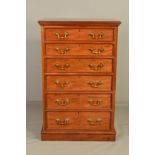 A MID VICTORIAN WALNUT CHEST OF SIX GRADUATED LONG DRAWERS, moulded rectangular top, Gothic style