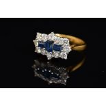 AN 18CT GOLD, SAPPHIRE AND DIAMOND RING, designed as three rectangular cut sapphires, the central