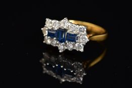 AN 18CT GOLD, SAPPHIRE AND DIAMOND RING, designed as three rectangular cut sapphires, the central