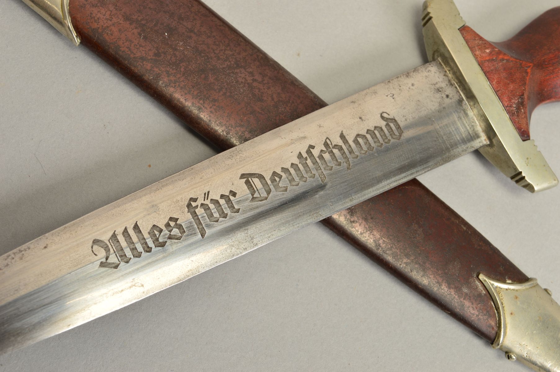 A GERMAN 3RD REICH ISSUE 'SA' DAGGER AND SCABBARD, the grip has the usual SA logo and Eagle swastika - Image 3 of 6