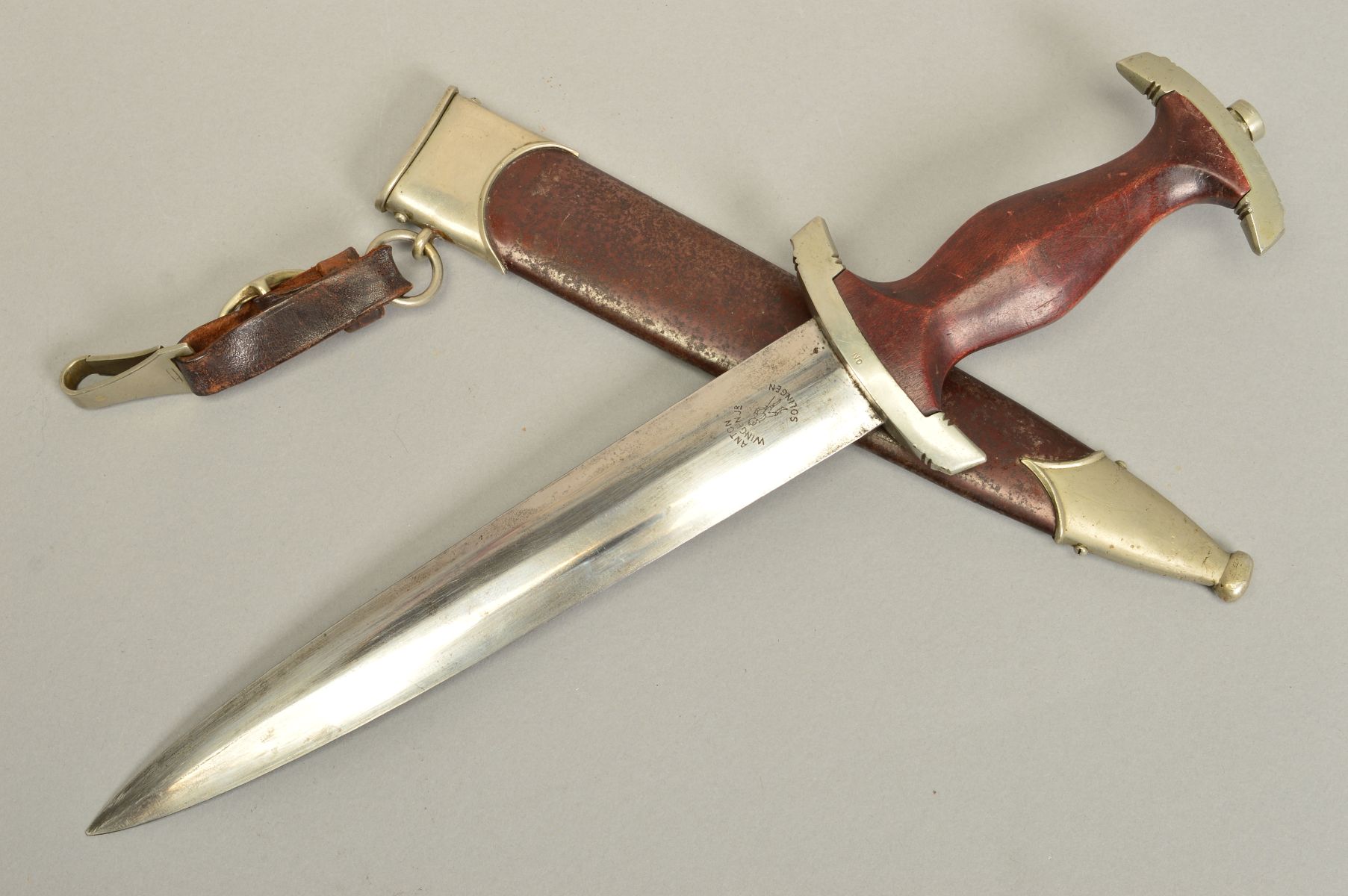A GERMAN 3RD REICH ISSUE 'SA' DAGGER AND SCABBARD, the grip has the usual SA logo and Eagle swastika - Image 4 of 6
