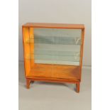 A 1960'S / 1970'S TEAK DOUBLE SLIDING GLAZED BOOKCASE, with two glass shelves, width 91.5cm x