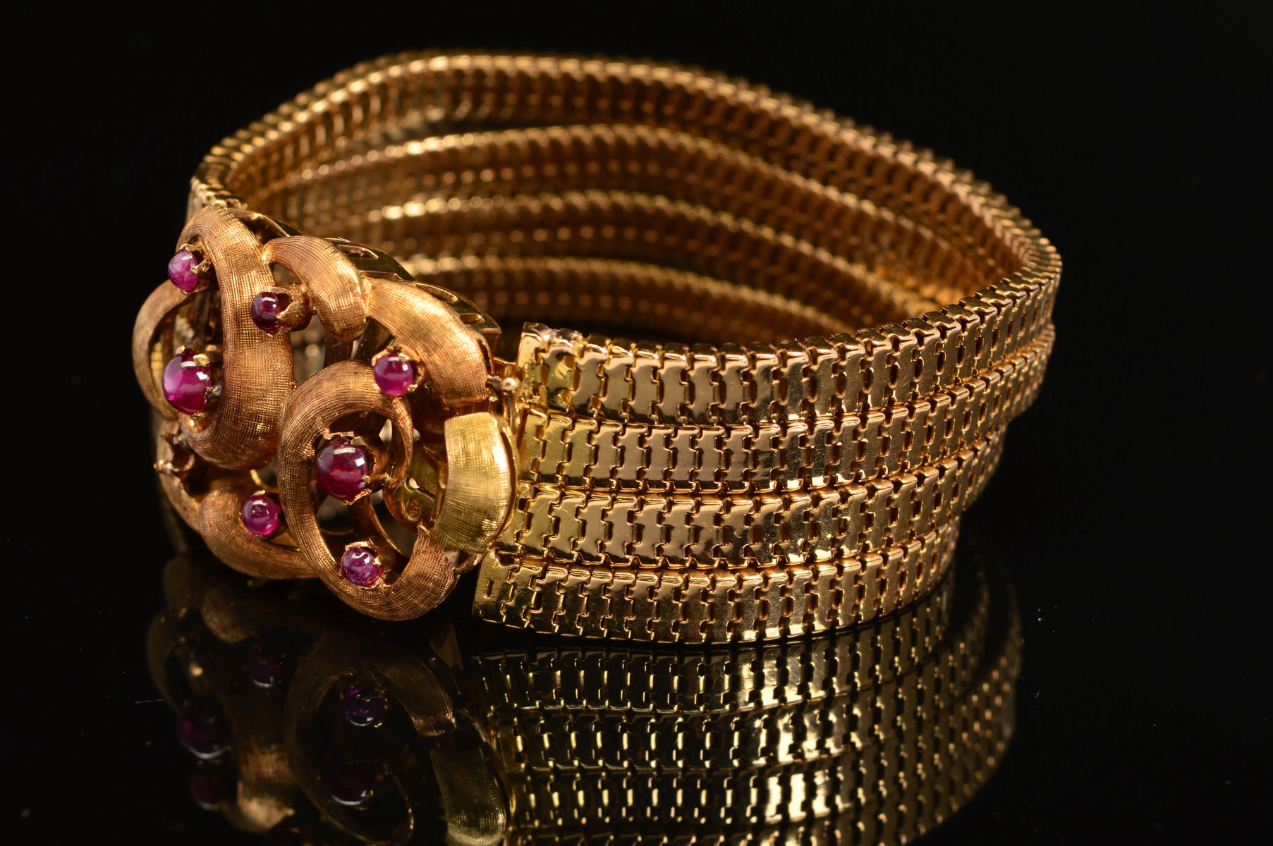 A CONTINENTAL FOUR ROW SNAKE BRACELET, fitted to large feature scroll design clasp set with - Image 3 of 6