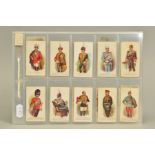 A COLLECTION OF FIFTY SEVEN TADDY'S CIGARETTE CARDS ON A MILITARY THEME, featuring incomplete sets