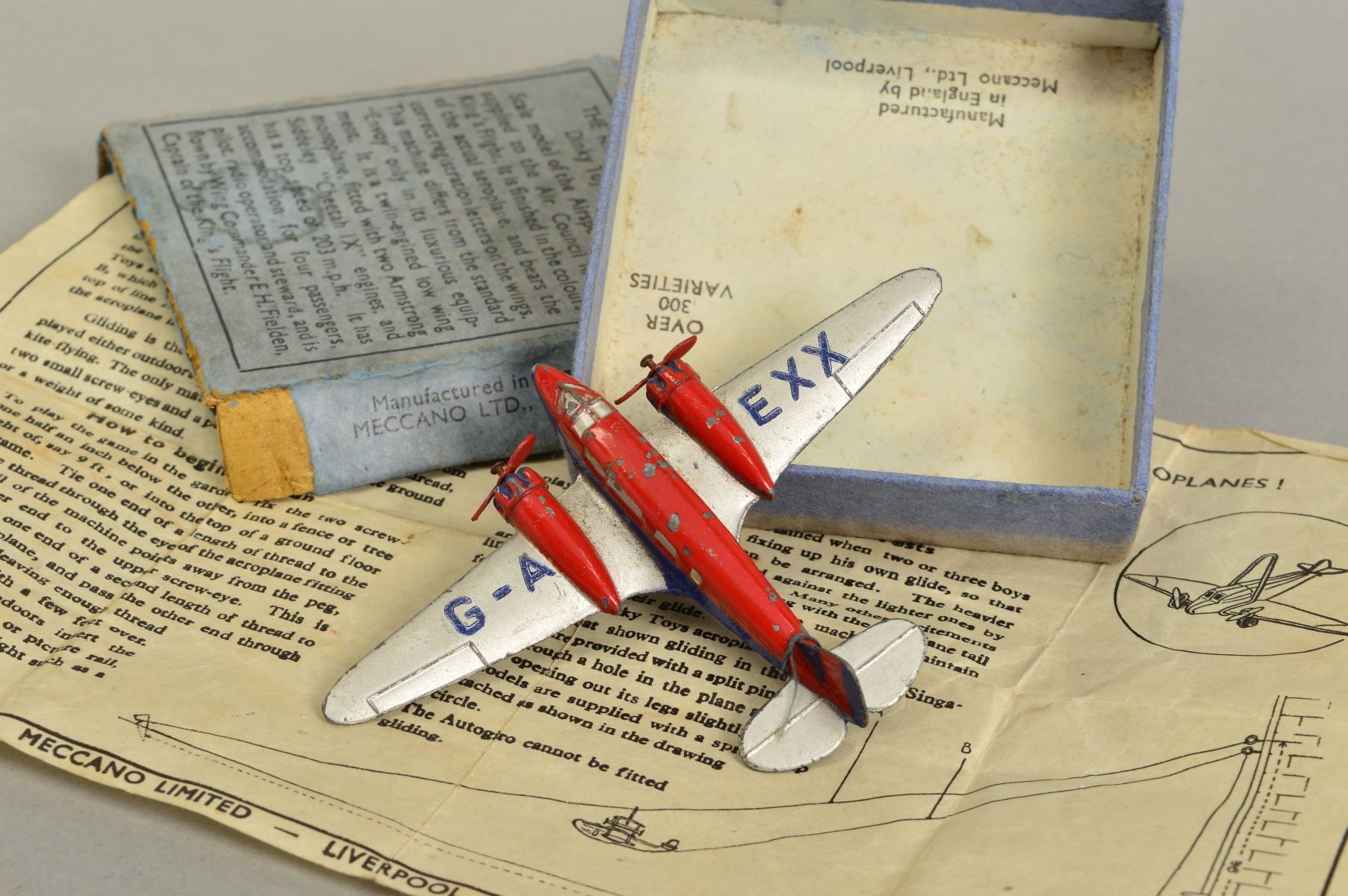 A BOXED DINKY TOYS THE KING'S AEROPLANE, No.62k, Airspeed 'Envoy' red and blue fuselage and engines, - Image 3 of 5