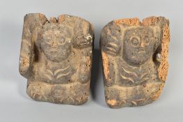 A PAIR OF 18TH CENTURY CARVED AND STAINED WOODEN CORBELS, of primitive human form, height